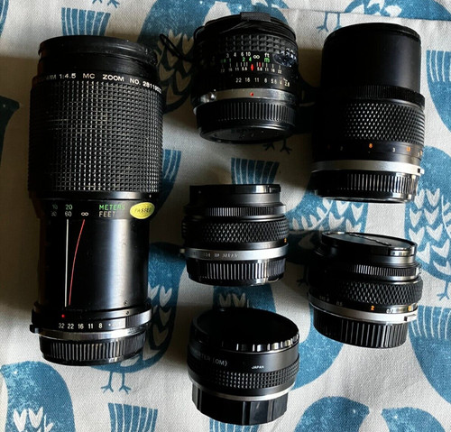 Various used camera lenses - various,